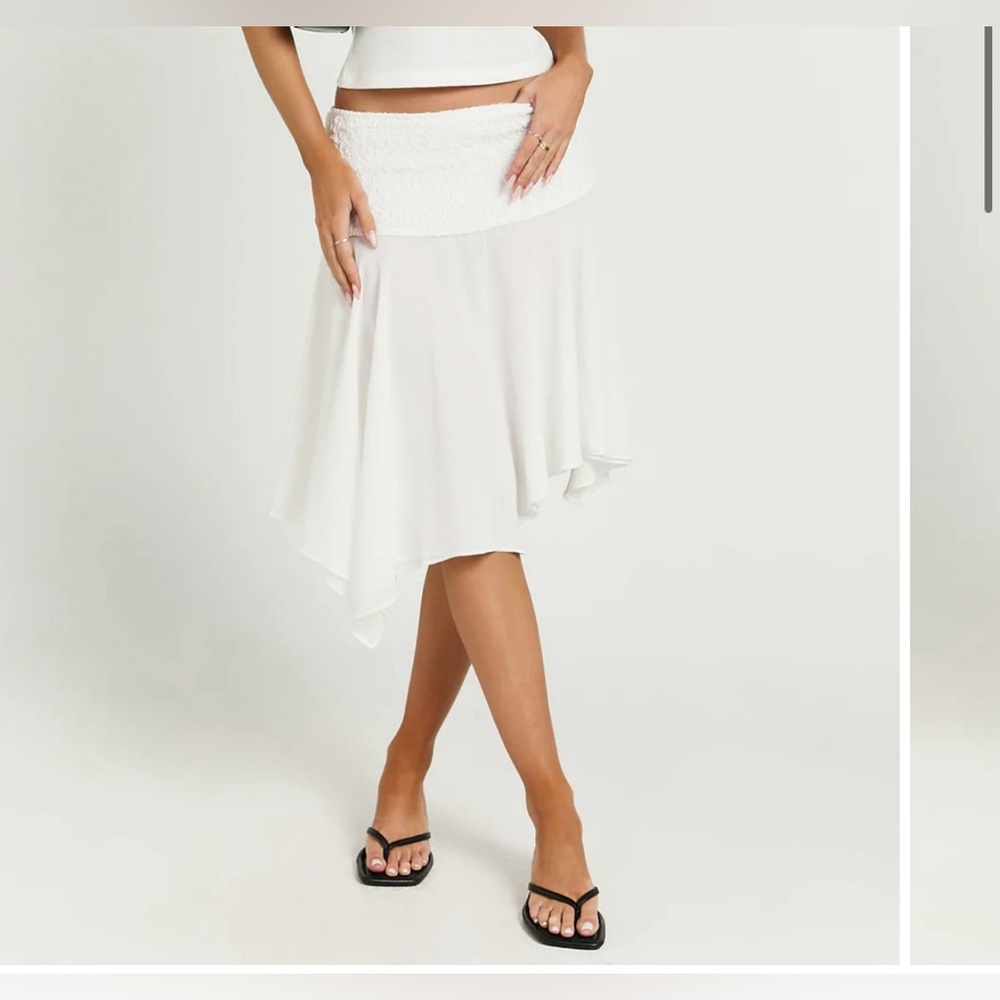 Asymmetrical white skirt